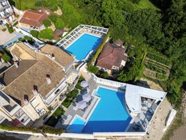 2 outdoor pools, pool umbrellas, sun loungers