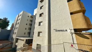 A multi-story building with a sign reading "EDIFICI SOROLLA".