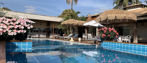 Outdoor pool, pool umbrellas, pool loungers