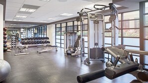 A gym with various exercise equipment, including dumbbells, a bench press, and a cable machine. - Westin St. John 3BR, 3BA Pool Villa  - Christmas Week 2026 - Dec. 20-27, 2026 (Cruz Bay)