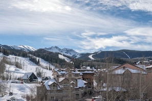 A mountain resort with snow-covered buildings and a ski slope. - Westermere 411 3 Bedroom/3 Bathroom Condo (Mountain Village)