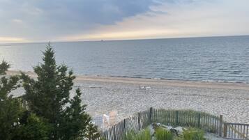 On the beach, sun loungers, beach towels