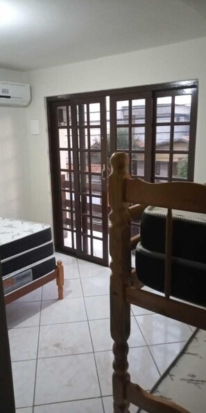 Quadruple Room | Blackout drapes, bed sheets