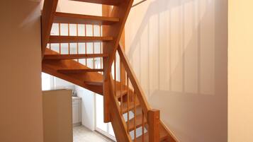 Exclusive-Apartment | Wohnbereich | 55-Zoll-Flachbildfernseher mit Kabelempfang, Smart-TV