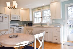 Fridge, microwave, oven, stovetop - Cozy three bedroom home with updated eat in kitchen (Dennis Port)