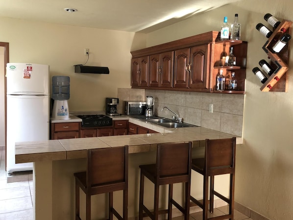 Microwave, coffee/tea maker, cookware/dishes/utensils