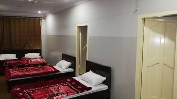 Standard Room, Multiple Beds, City View | Living room | Fireplace