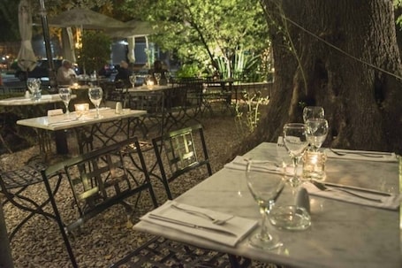 Outdoor dining. Beautiful apartment with french balcony.