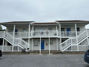 Guests can enjoy a stay in one of the rooms with a balcony overlooking the surrounding area.