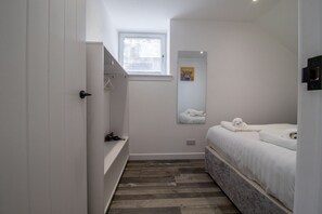 2 dormitorios, tabla de planchar con plancha, wifi y ropa de cama