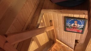 A wooden staircase with a framed poster of 'The Sound of Music' on the wall. - Chalet / stone house (Sainte-Foy-Tarentaise)