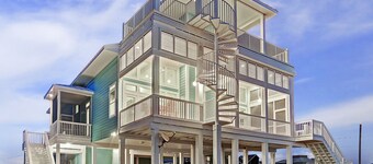 Get the best of both worlds, beach & bay, in this luxurious waterfront home.