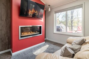 Smart TV, fireplace, table football