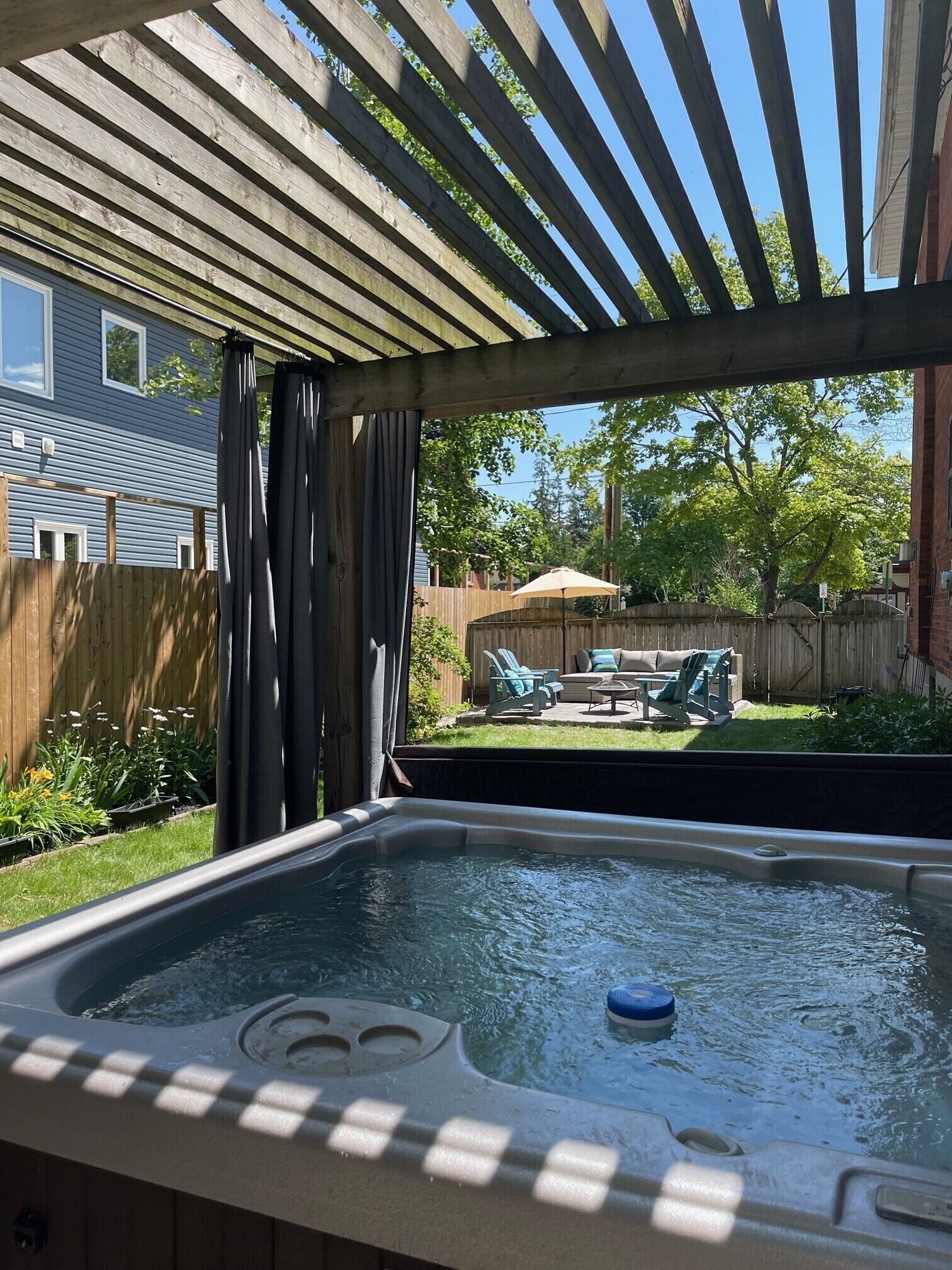 View from the hot tub towards the 2nd patio/seating area