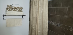 Hair dryer, towels, soap, toilet paper