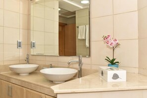 Hair dryer, towels, soap, shampoo