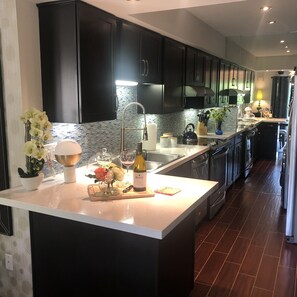 Fridge, microwave, oven, stovetop - Modern Palm Springs condo just a short walk from downtown (Palm Springs)