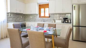 Fridge, coffee/tea maker, electric kettle, toaster