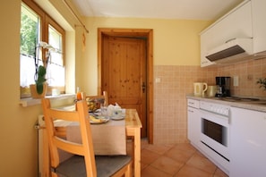 Fridge, stovetop, coffee/tea maker, electric kettle