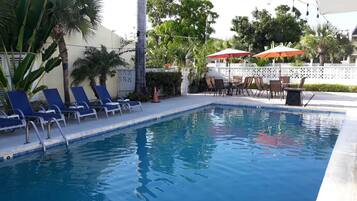 Outdoor pool, pool umbrellas, sun loungers