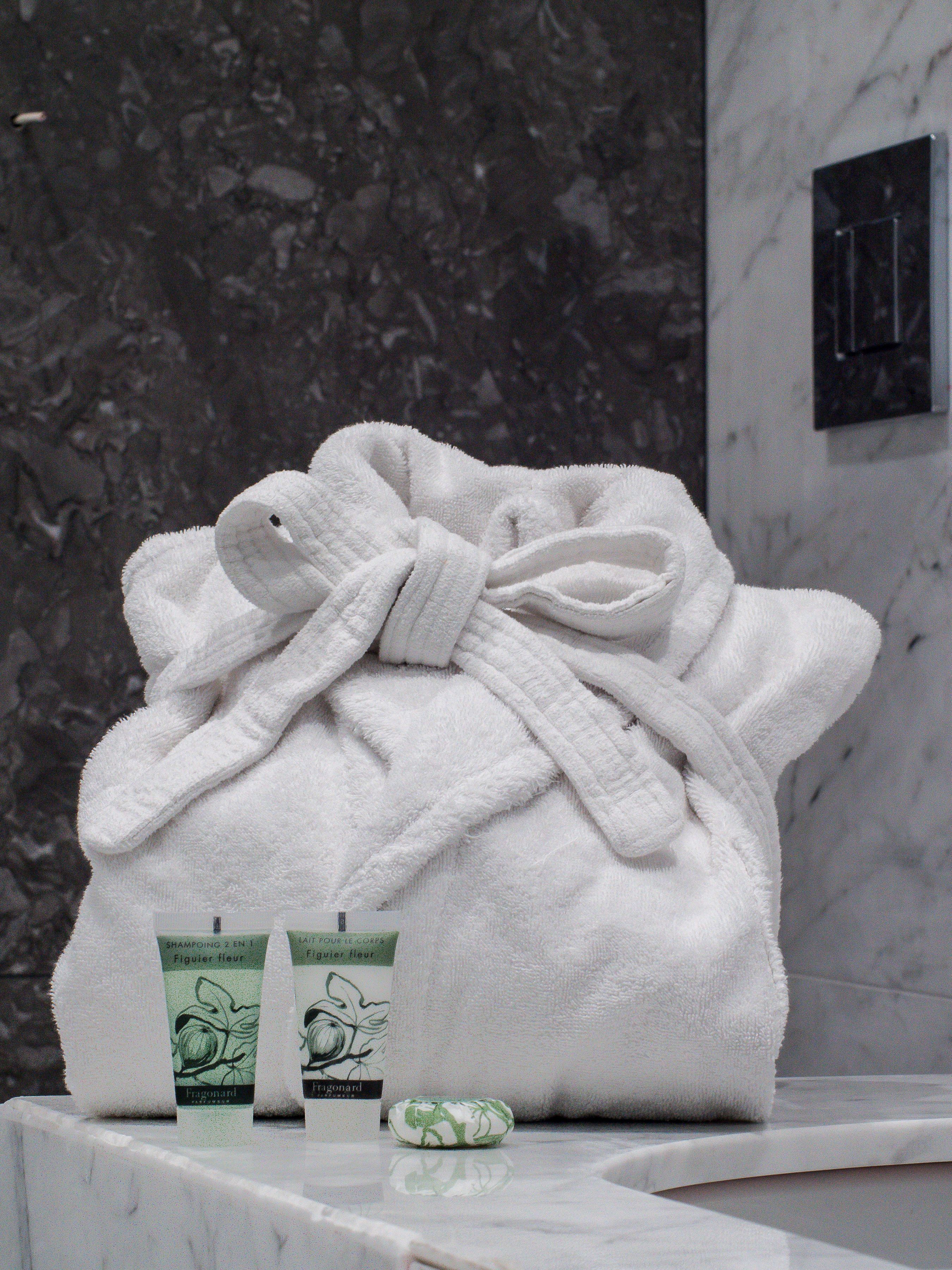 junior suite, 1 queen bed | bathroom amenities | designer toiletries, hair dryer, bathrobes, slippers