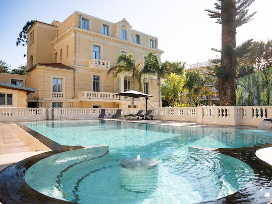 Outdoor pool, open 8:00 AM to 8:00 PM, pool umbrellas, sun loungers