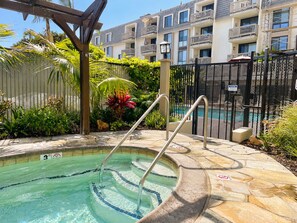 Outdoor pool, a heated pool - Remodeled Oceanfront Condo with Southerly Beach & Pier Views. Family Friendly!!! (Oceanside)