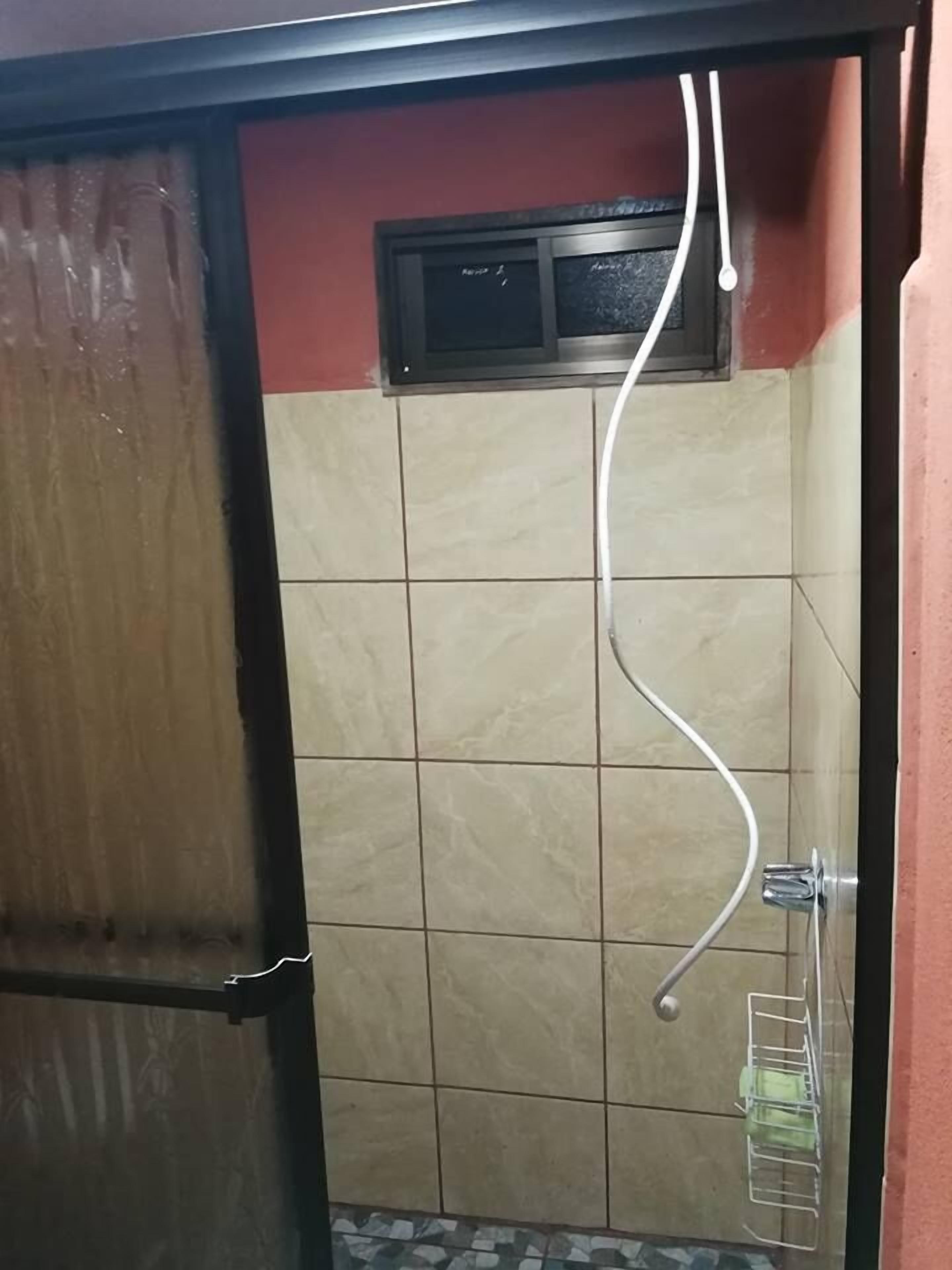Basic Room, 1 Bedroom, Courtyard View, Lakeside | Bathroom | Shower, hair dryer, towels, soap