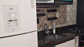 Fridge, microwave, stovetop, coffee/tea maker