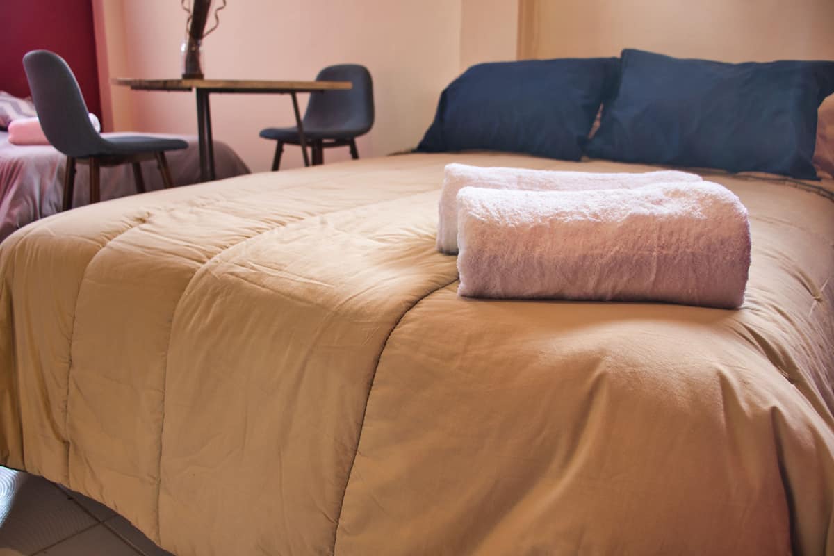 Family Room | Premium bedding, down comforters, memory foam beds, laptop workspace