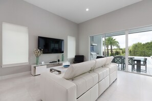 TV - Modern Luxury Villa | Splash Pad, Car Pool Table, Movie Room, Custom Kid Bedroom (Kissimmee)