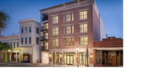 A multi-story hotel with a brick facade, large windows, and a ground-level entrance. - The King 583 in Charleston (Charleston)