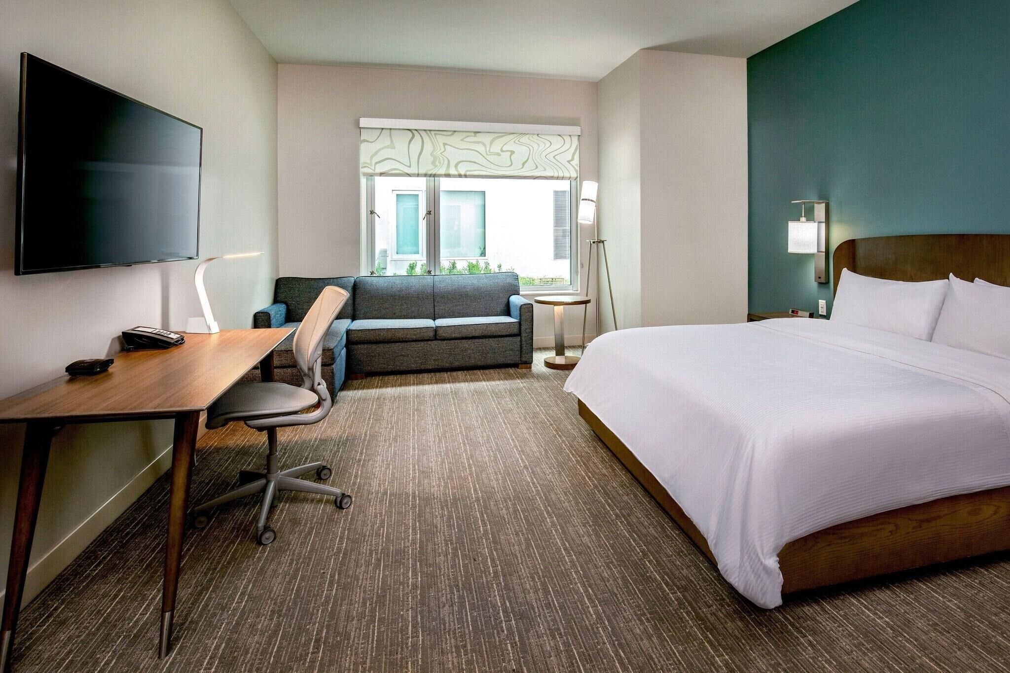Premium bedding, down comforters, memory foam beds, in-room safe