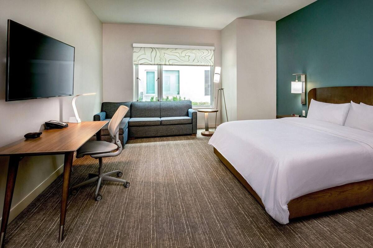 Premium bedding, down comforters, memory foam beds, in-room safe