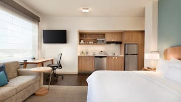 Premium bedding, down comforters, memory foam beds, in-room safe