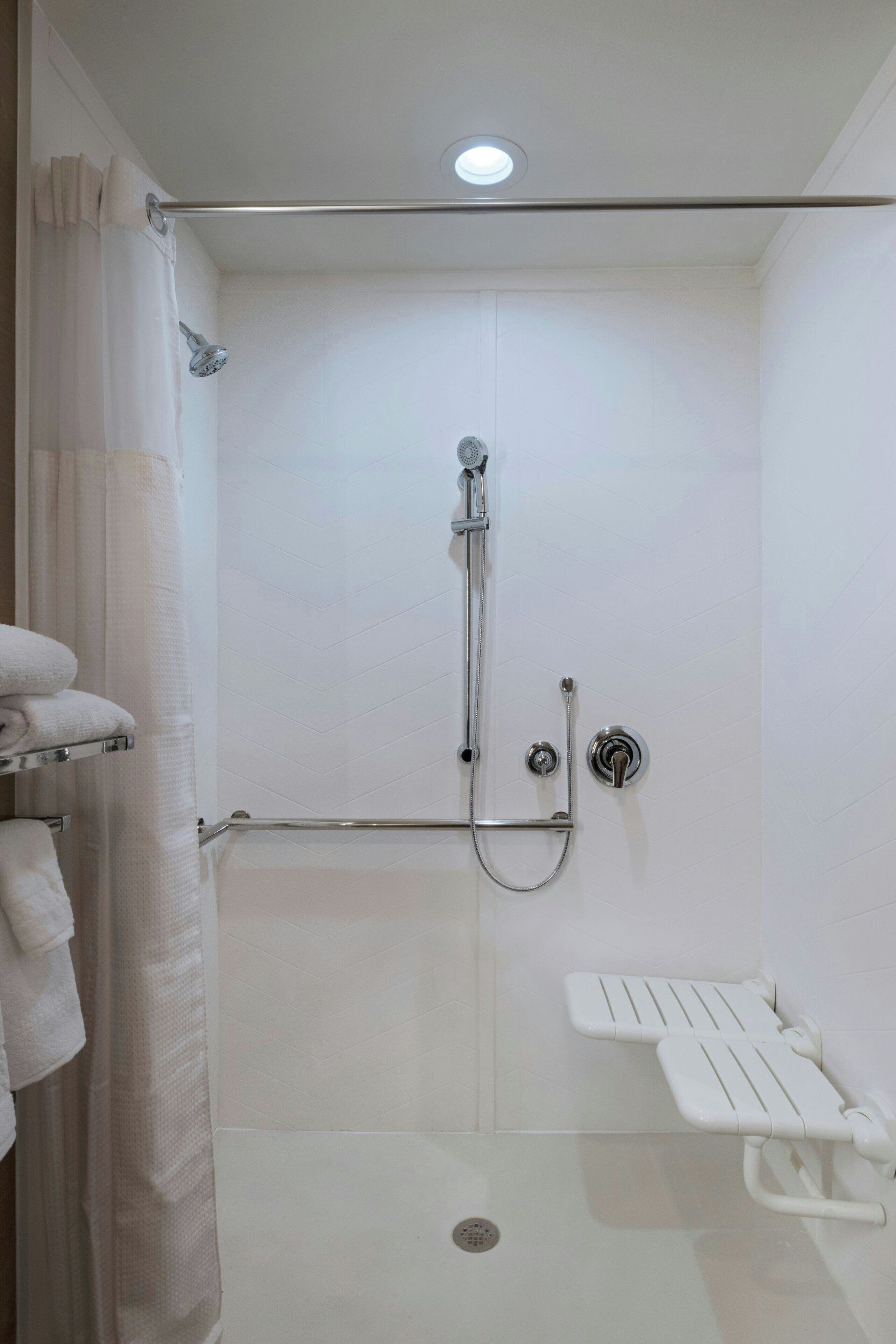 combined shower/bathtub, free toiletries, hair dryer, towels