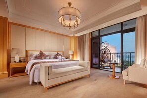 A spacious bedroom with a large bed, a sitting area, and a balcony with a view. - Bright Hotel Huaibei (HUAIBEI)