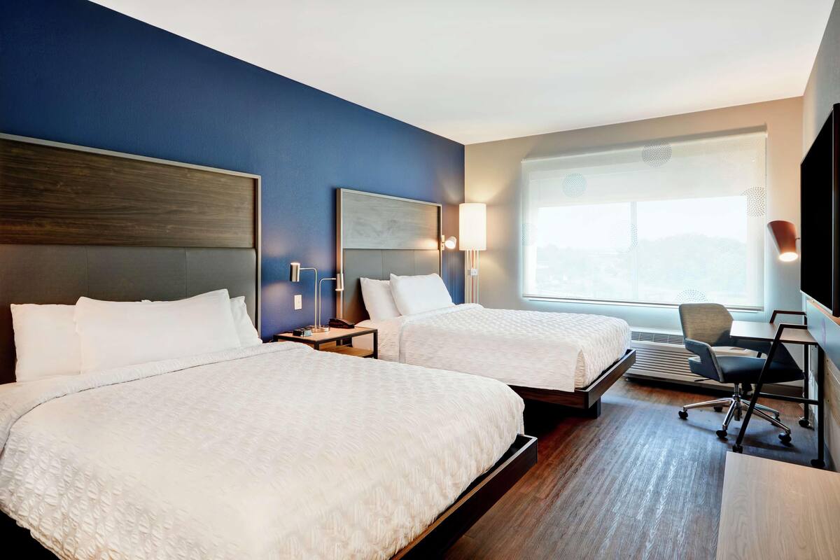 Premium bedding, desk, blackout curtains, iron/ironing board