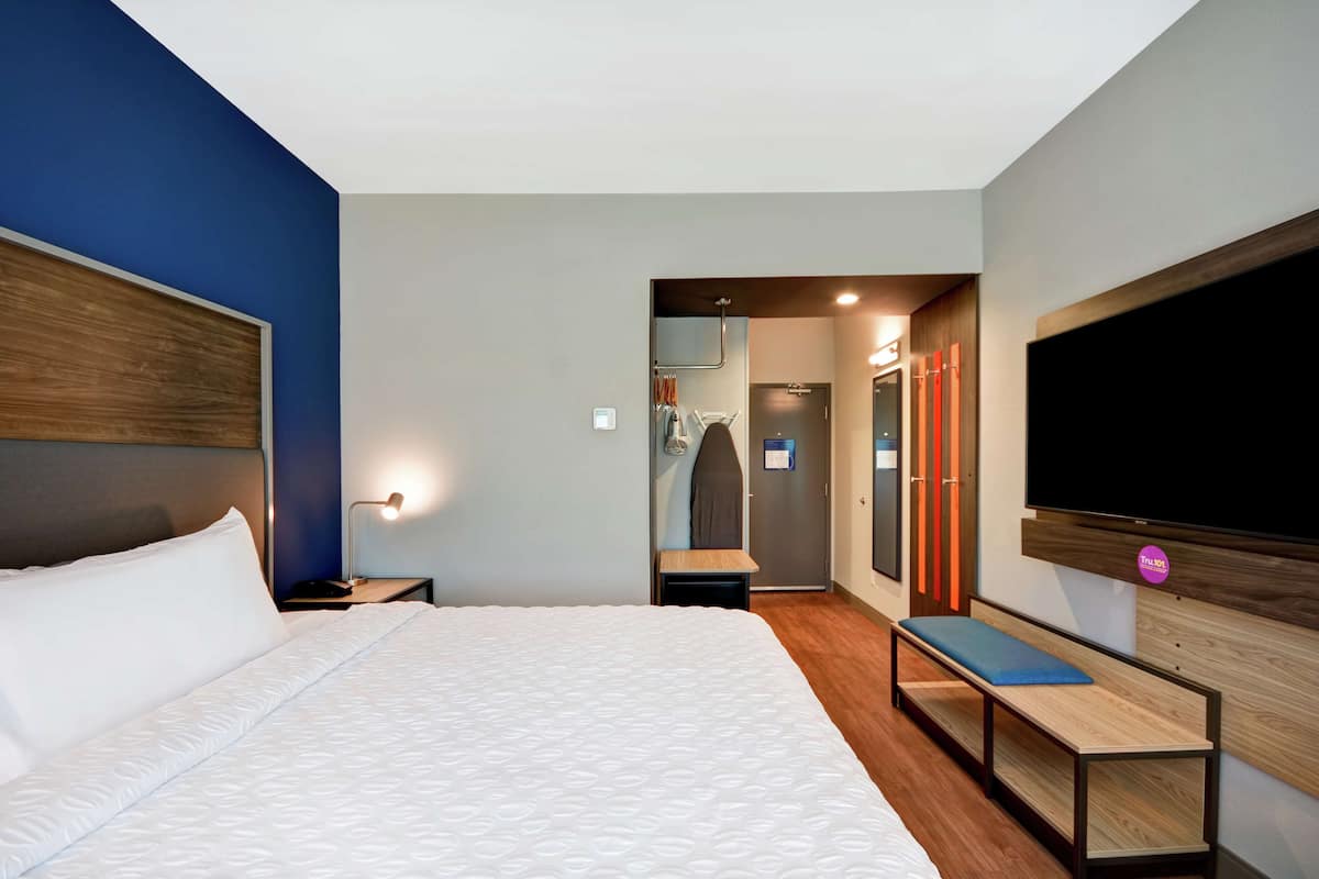 premium bedding, desk, blackout curtains, iron/ironing board