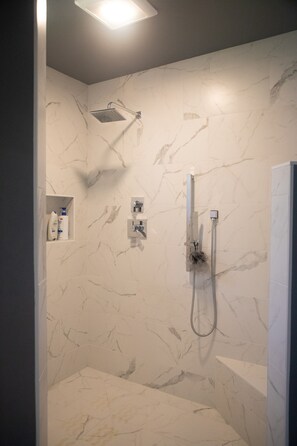 Bathtub, hair dryer, towels, soap