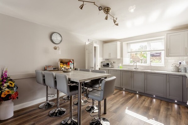 Fridge, microwave, oven, high chair