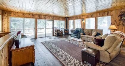 Rustic home with a wood stove, private dry sauna, & two decks with forest views