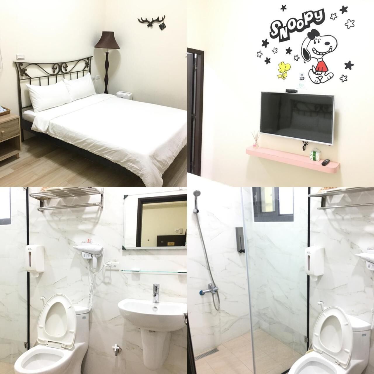 A bedroom with a bed, bedside lamp, and a wall-mounted TV. The bathroom includes a toilet, sink, and shower.
