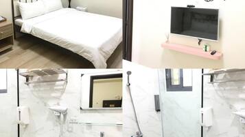 A bedroom with a bed, bedside lamp, and a wall-mounted TV. The bathroom includes a toilet, sink, and shower.