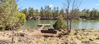 Rainbow Lake home in gated community with boats,  hot tub, Tesla EV and lake acc