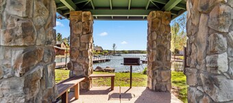 Rainbow Lake home in gated community w/ boats,  hot tub, and private lake access
