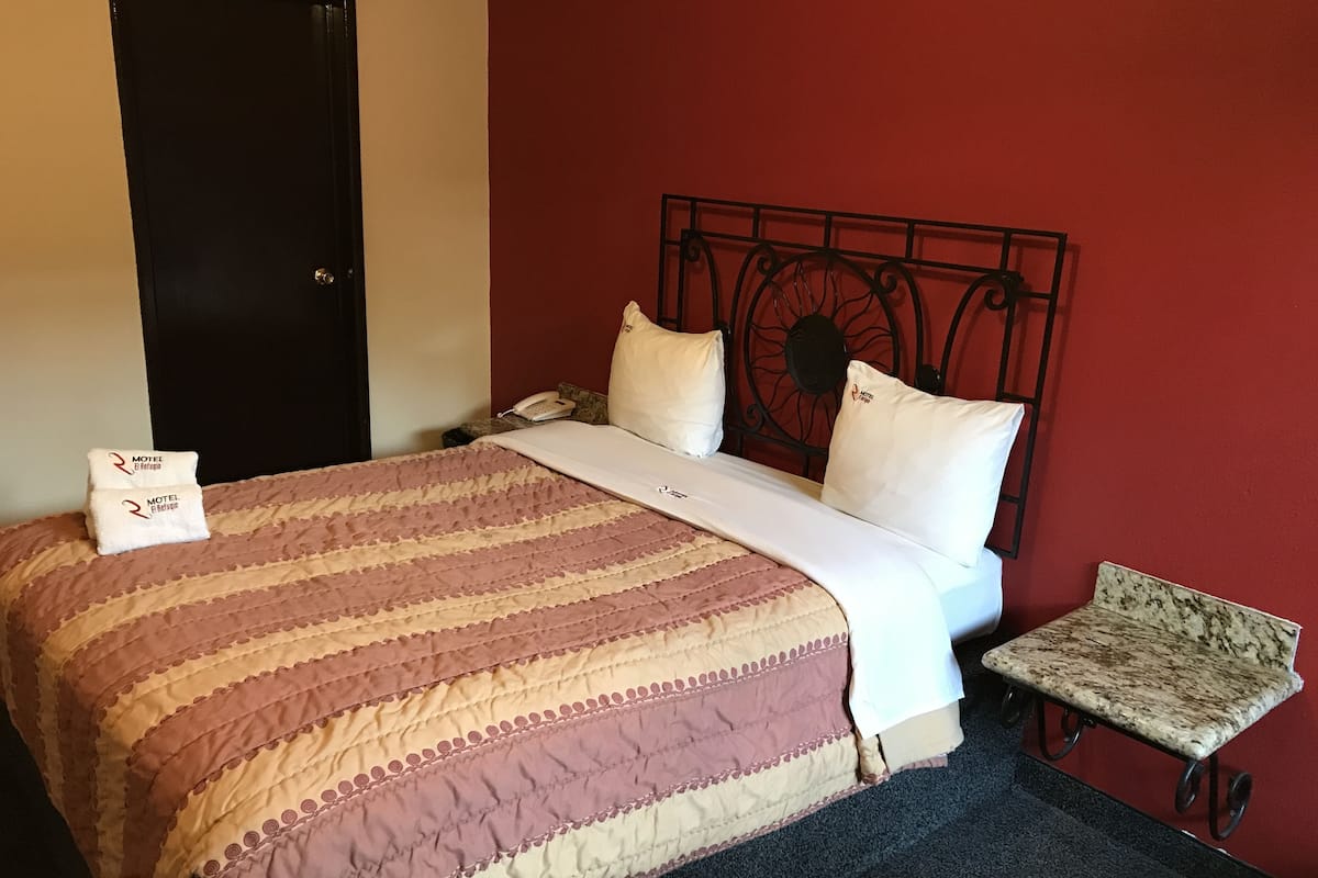 Classic Room, 1 Queen Bed | Laptop workspace, iron/ironing board (on request), WiFi (free)