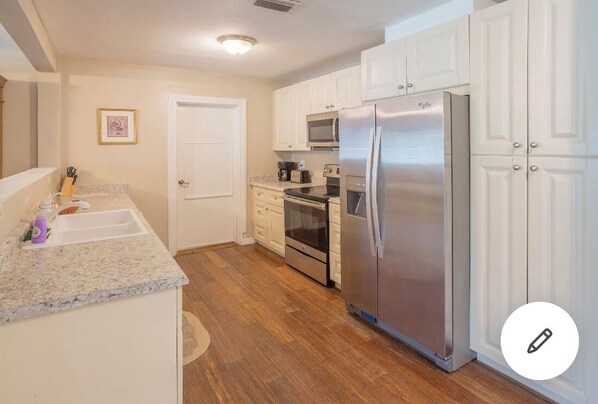 Microwave, dishwasher, coffee/tea maker, cookware/dishes/utensils