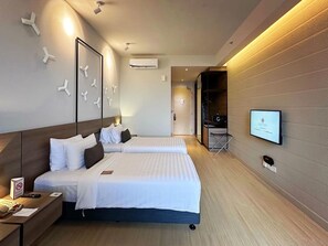 Habitación Deluxe con 2 camas individuales | Caja fuerte, escritorio, espacio para trabajar con un portátil