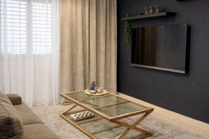 Family Apartment, 2 Bedrooms, Kitchen, City View | Television - Stylish Tel Aviv (Tel Aviv)